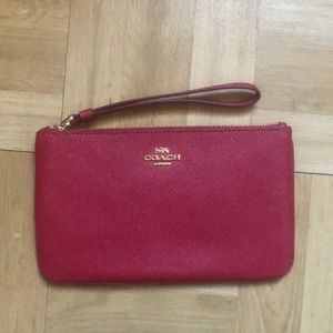 COACH red clutch-wristlet